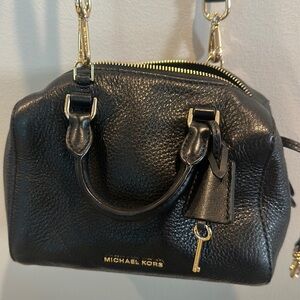 Black Michael Kors bag could be a Crossbody or a handbag